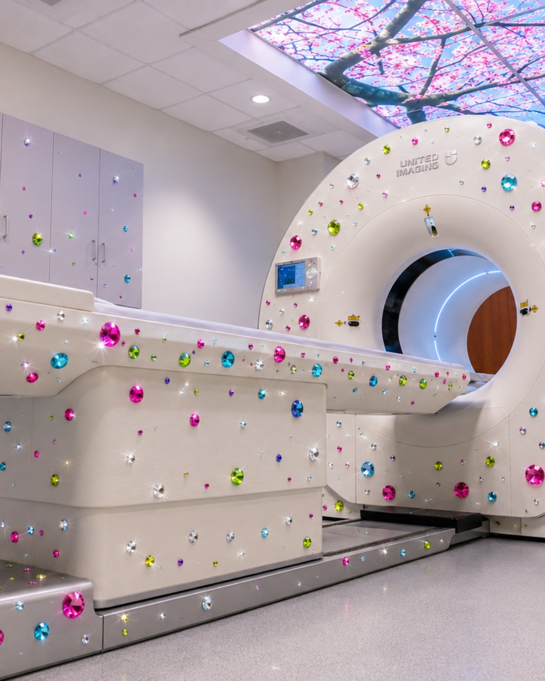 A United Imaging medical scanner decorated with colorful jewel-like gems for the bedazzling social trend.